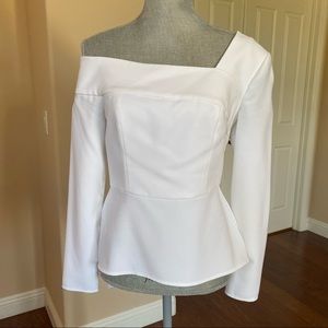 white asymmetrical shoulder peplum top